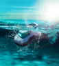 Aiper Scuba SE robotic pool cleaner moving across a pool floor under clear water